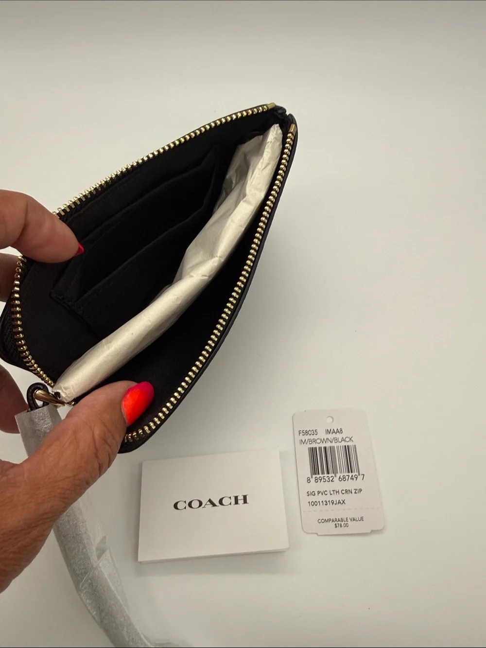Coach Brown and Black Signature Zip Card Holder 45.00